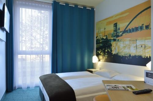 Imagen de la habitación del Hotel B&B Köln-messe. Foto 10