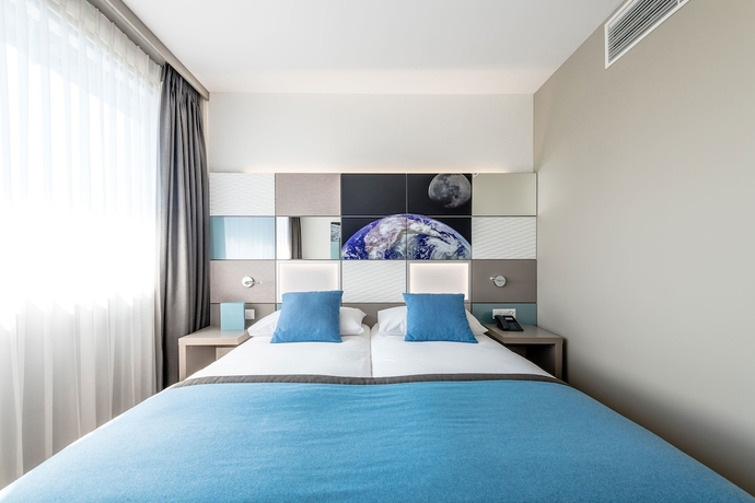 Imagen de la habitación del Hotel B&B Lausanne Crissier. Foto 8