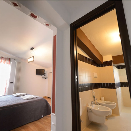 Imagen de la habitación del Hotel B&B Le Gemme. Foto 7