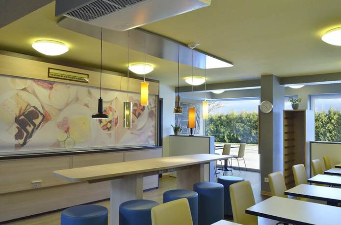 Imagen del bar/restaurante del Hotel B&B Leipzig-Nord. Foto 3