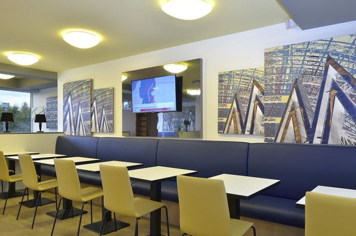 Imagen del bar/restaurante del Hotel B&B Leipzig-Nord. Foto 4