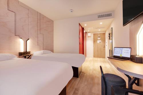 Imagen de la habitación del Hotel B&B Lille Lillenium Eurasanté. Foto 17