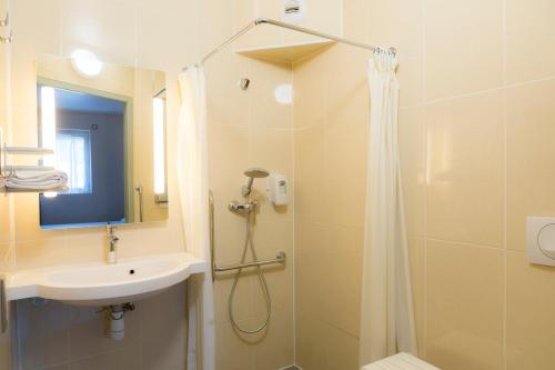 Imagen de la habitación del Hotel B&B Limoges 1. Foto 7