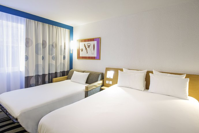 Imagen de la habitación del Hotel B&B Lyon Nord. Foto 13