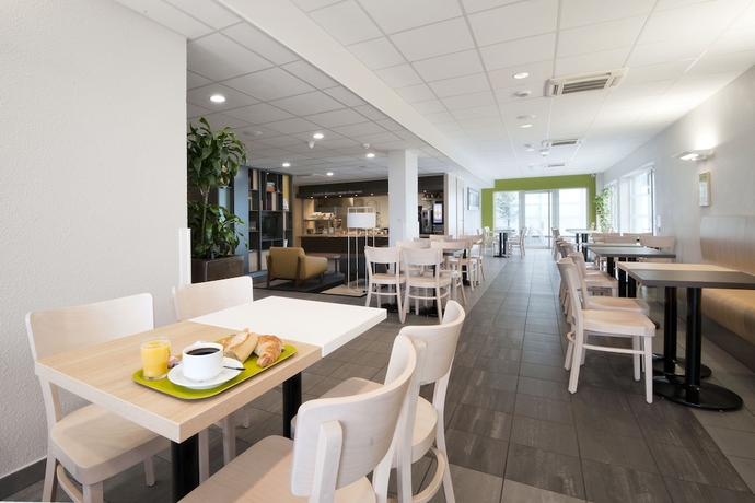 Imagen del bar/restaurante del Hotel B&B Lyon Sud Etats Unis. Foto 5