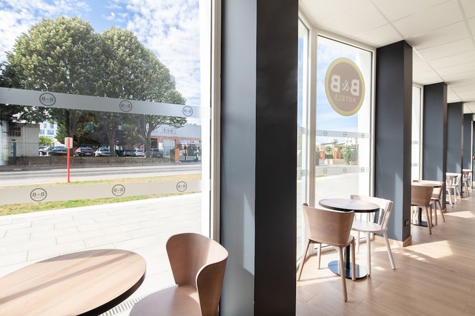 Imagen del bar/restaurante del Hotel B&B Massy Gare TGV. Foto 3