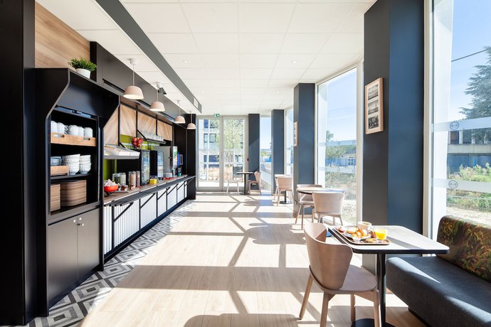 Imagen del bar/restaurante del Hotel B&B Massy Gare TGV. Foto 5