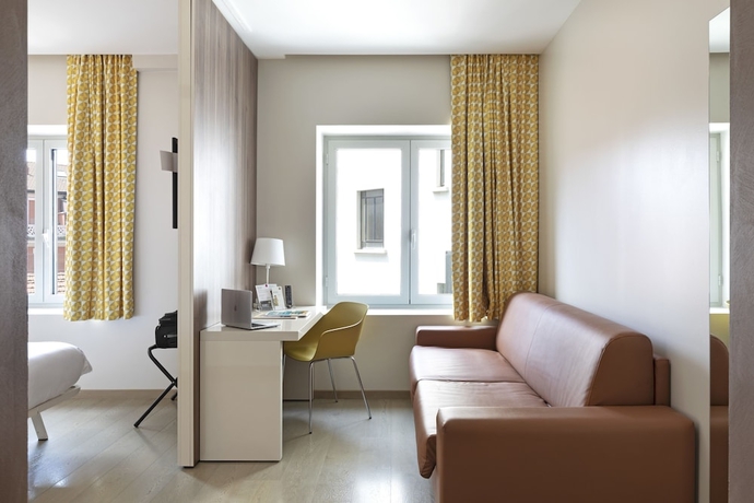 Imagen de la habitación del Hotel B&B Milano Central Station. Foto 11