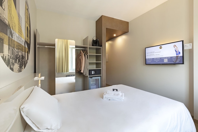 Imagen de la habitación del Hotel B&B Milano Central Station. Foto 16
