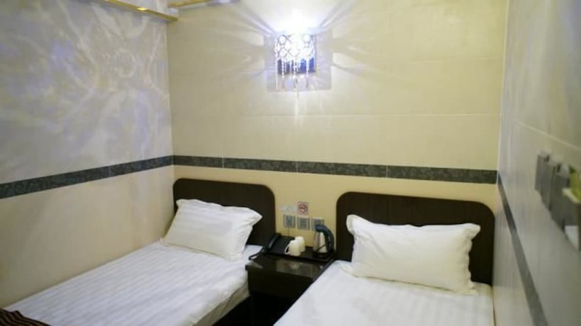 Imagen de la habitación del Hotel B&B Mongkok. Foto 2