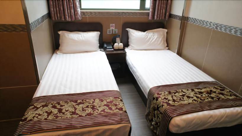 Imagen de la habitación del Hotel B&B Mongkok. Foto 9