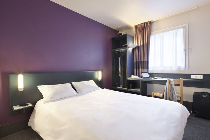 Imagen de la habitación del Hotel B&B Moulins. Foto 11