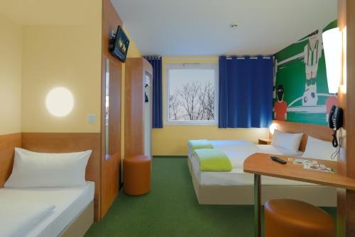 Imagen de la habitación del Hotel B&B Mönchengladbach. Foto 8