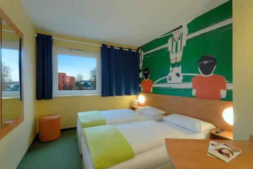 Imagen de la habitación del Hotel B&B Mönchengladbach. Foto 10