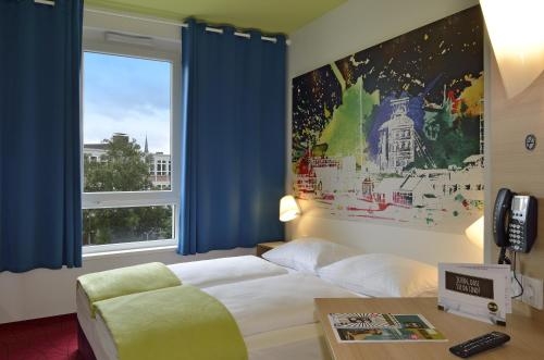 Imagen de la habitación del Hotel B&B M&uuml;lheim An Der Ruhr. Foto 9