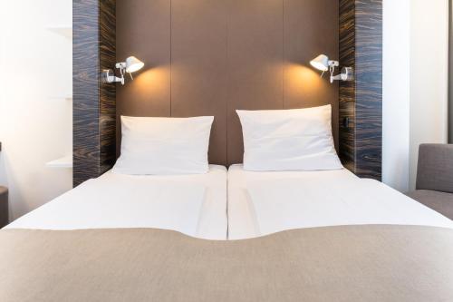 Imagen de la habitación del Hotel B&B München-Putzbrunn. Foto 2