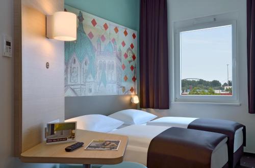 Imagen de la habitación del Hotel B&B Neuss. Foto 7