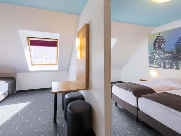 Imagen de la habitación del Hotel B&B N&uuml;rnberg-City. Foto 11