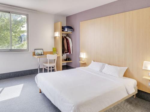 Imagen de la habitación del Hotel B&B Orange. Foto 3