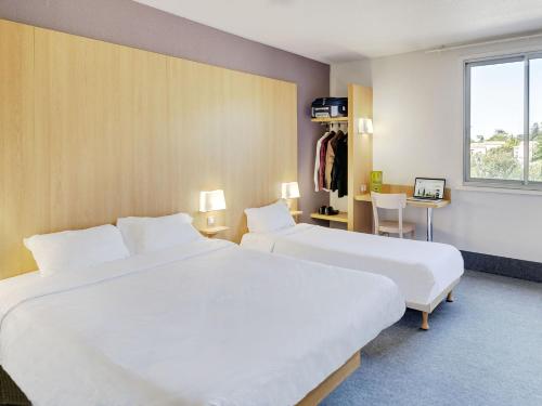 Imagen de la habitación del Hotel B&B Orange. Foto 6