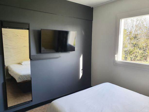 Imagen de la habitación del Hotel B&B Ouistreham. Foto 4