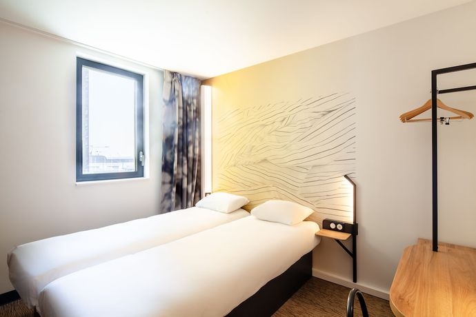 Imagen de la habitación del Hotel B&B Ouistreham. Foto 8