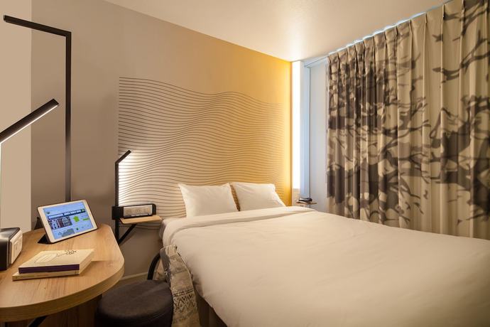Imagen de la habitación del Hotel B&B Ouistreham. Foto 9