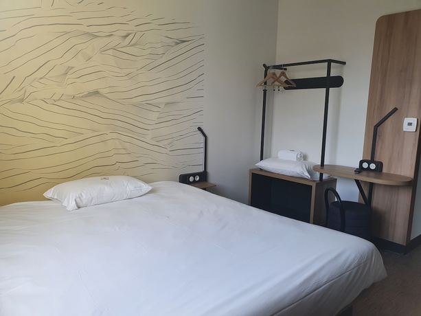 Imagen de la habitación del Hotel B&B Ouistreham. Foto 13