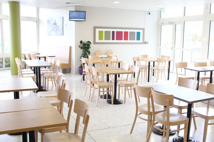 Imagen del bar/restaurante del Hotel B&B Paris Roissy CDG Aéroport. Foto 6