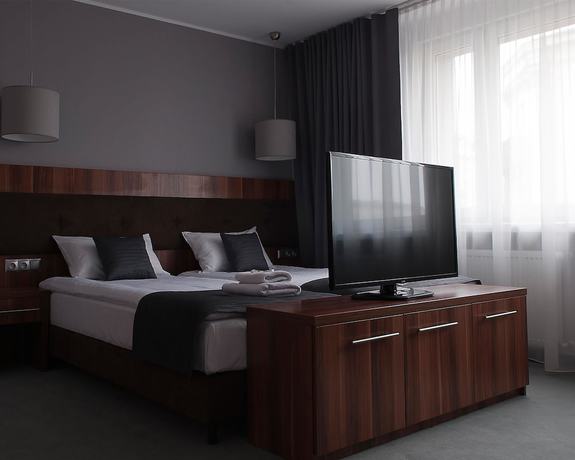 Imagen de la habitación del Hotel B&B Piotrk&oacute;w Trybunalski. Foto 11