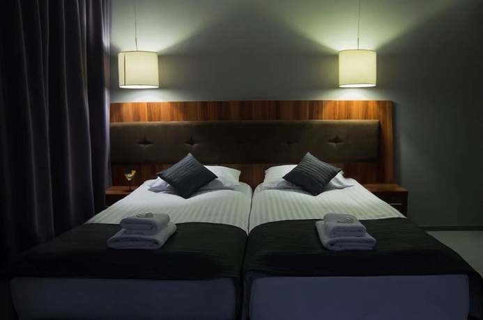 Imagen de la habitación del Hotel B&B Piotrk&oacute;w Trybunalski. Foto 12