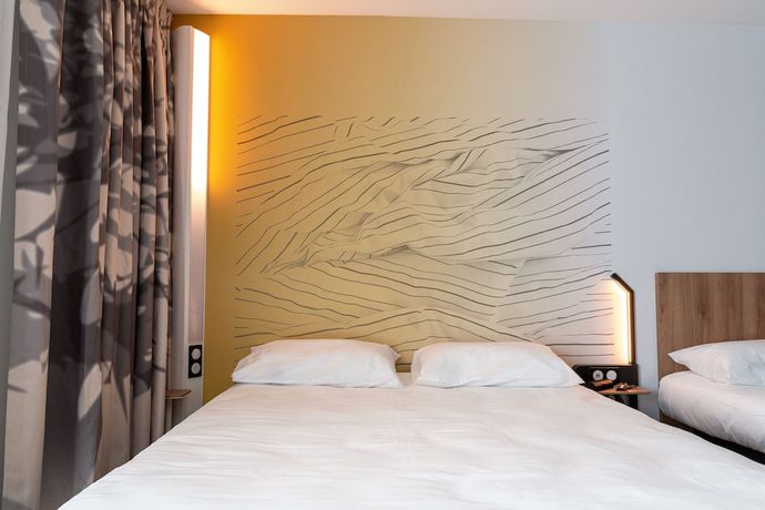 Imagen de la habitación del Hotel B&B Poitiers A&eacute;roport. Foto 13