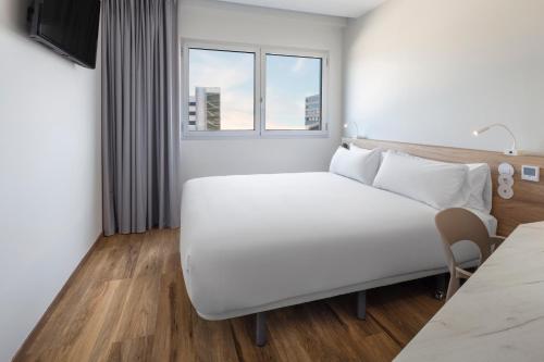 Imagen de la habitación del Hotel B&B Porto Expo Aeroporto. Foto 12