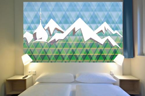 Imagen de la habitación del Hotel B&B Rosenheim. Foto 4