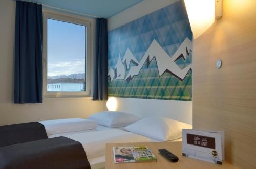 Imagen de la habitación del Hotel B&B Rosenheim. Foto 7