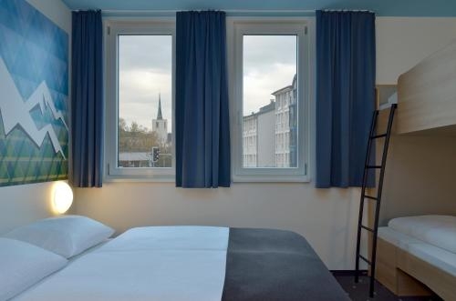 Imagen de la habitación del Hotel B&B Rosenheim. Foto 9