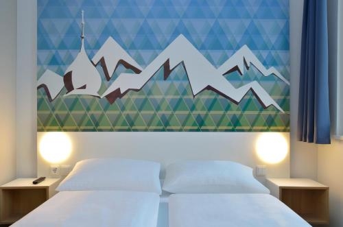 Imagen de la habitación del Hotel B&B Rosenheim. Foto 10