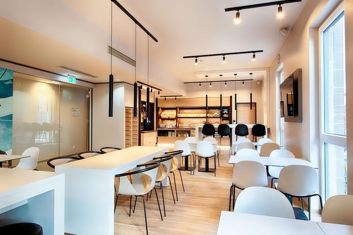 Imagen del bar/restaurante del Hotel B&B Rostock City-West. Foto 3
