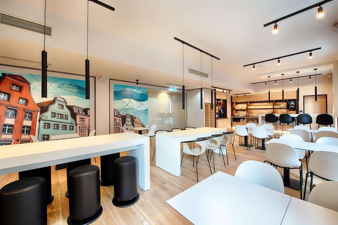 Imagen del bar/restaurante del Hotel B&B Rostock City-West. Foto 5