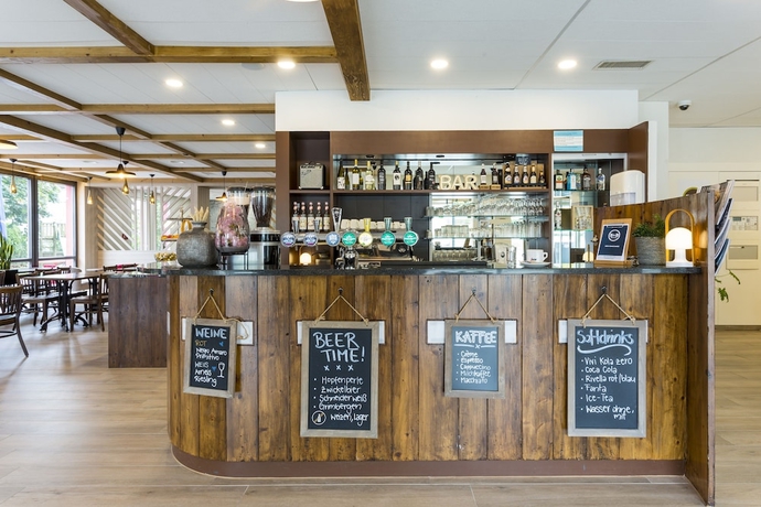 Imagen del bar/restaurante del Hotel B&B Rothrist Olten. Foto 7