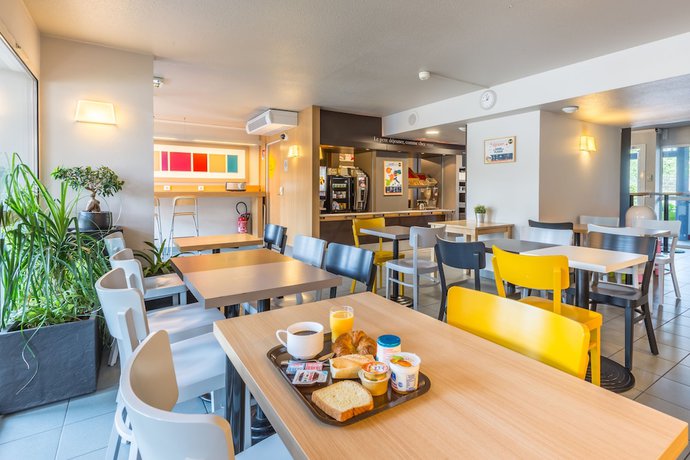 Imagen del bar/restaurante del Hotel B&B Strasbourg Sud Geispolsheim. Foto 3