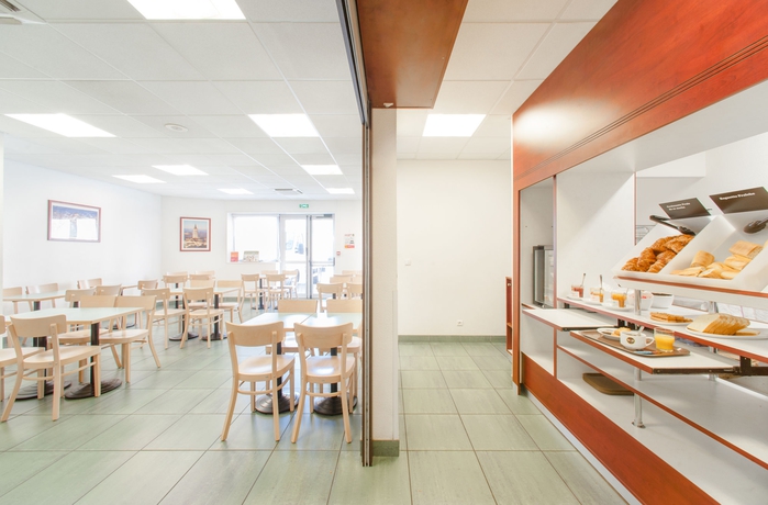 Imagen del bar/restaurante del Hotel B&B Toulouse Centre Canal du Midi. Foto 4