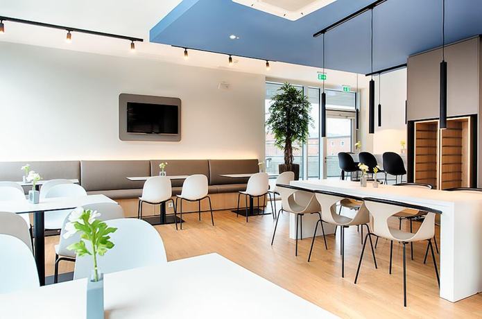 Imagen del bar/restaurante del Hotel B&B Ulm. Foto 2