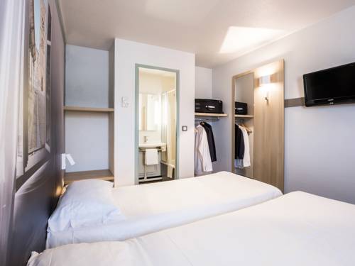 Imagen de la habitación del Hotel B&B Valenciennes. Foto 4