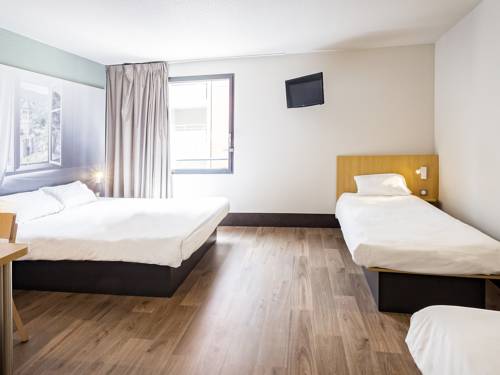 Imagen de la habitación del Hotel B&B Valenciennes. Foto 6