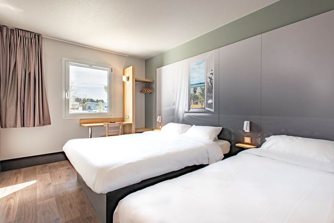 Imagen de la habitación del Hotel B&B Vannes Ouest Golfe du Morbihan. Foto 14