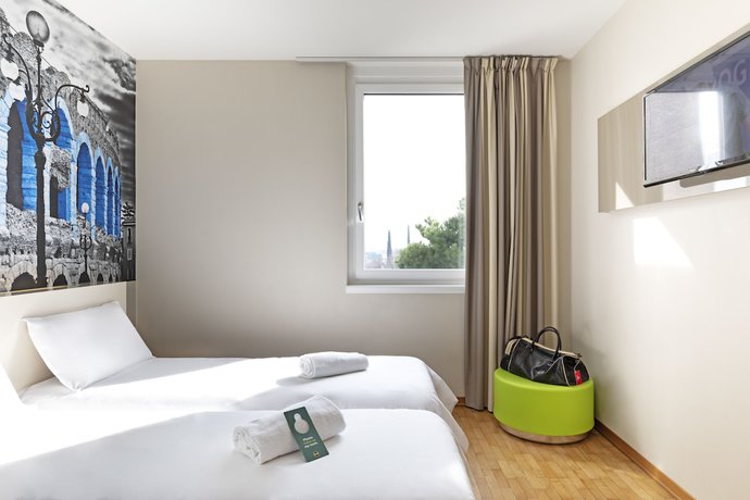 Imagen de la habitación del Hotel B&B Verona. Foto 13