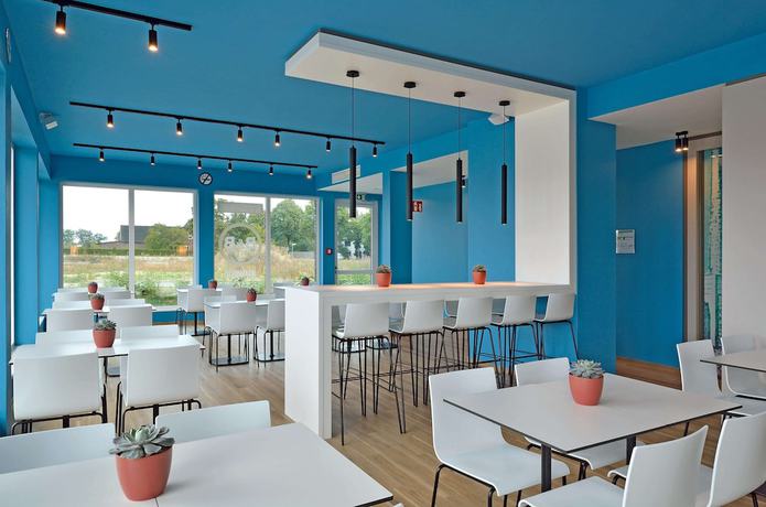 Imagen del bar/restaurante del Hotel B&B Wolfsburg-Weyhausen. Foto 5