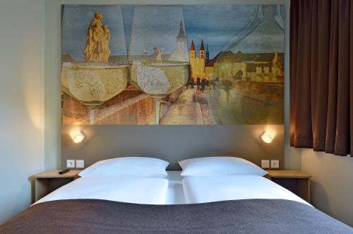 Imagen de la habitación del Hotel B&B Würzburg. Foto 7