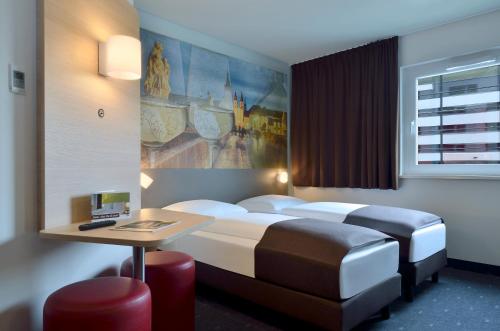 Imagen de la habitación del Hotel B&B Würzburg. Foto 10